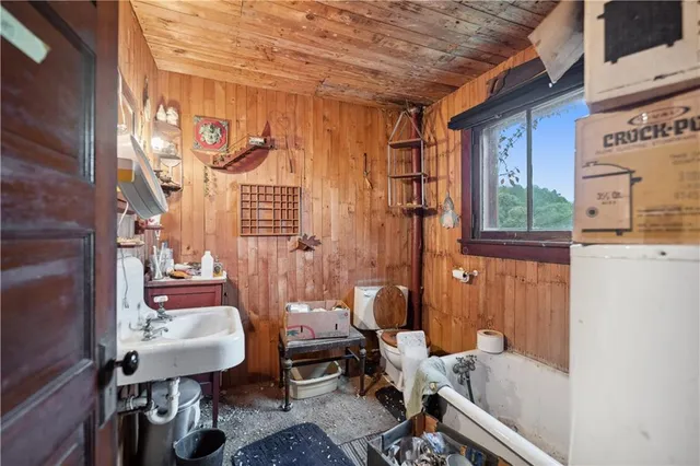 a bed room with a bed and a couch