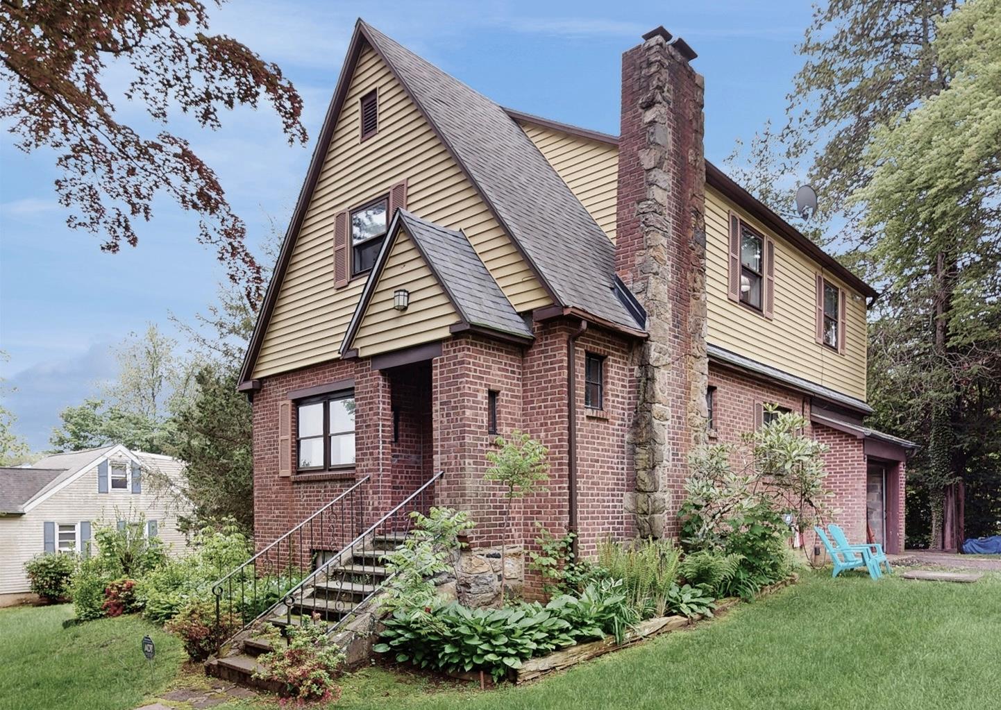 3 Byram Ridge Road South Armonk, NY 10504 - Photo 1 of 1 View of home's exterior featuring brick siding and decorative chimney.