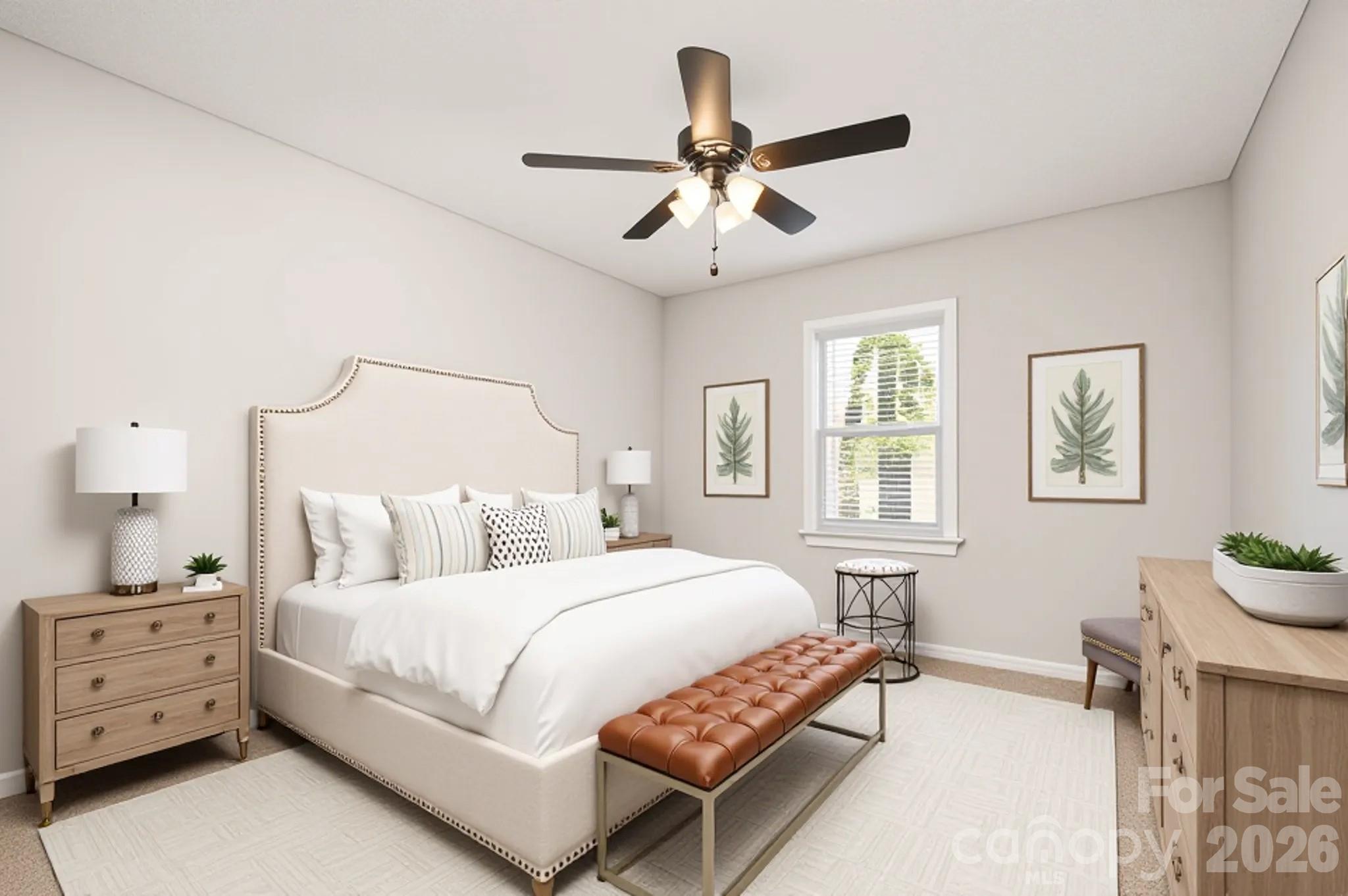 123 General Pemberton Street Stanley, NC 28164 - Photo 27 of 32 a bedroom with a bed and a chandelier