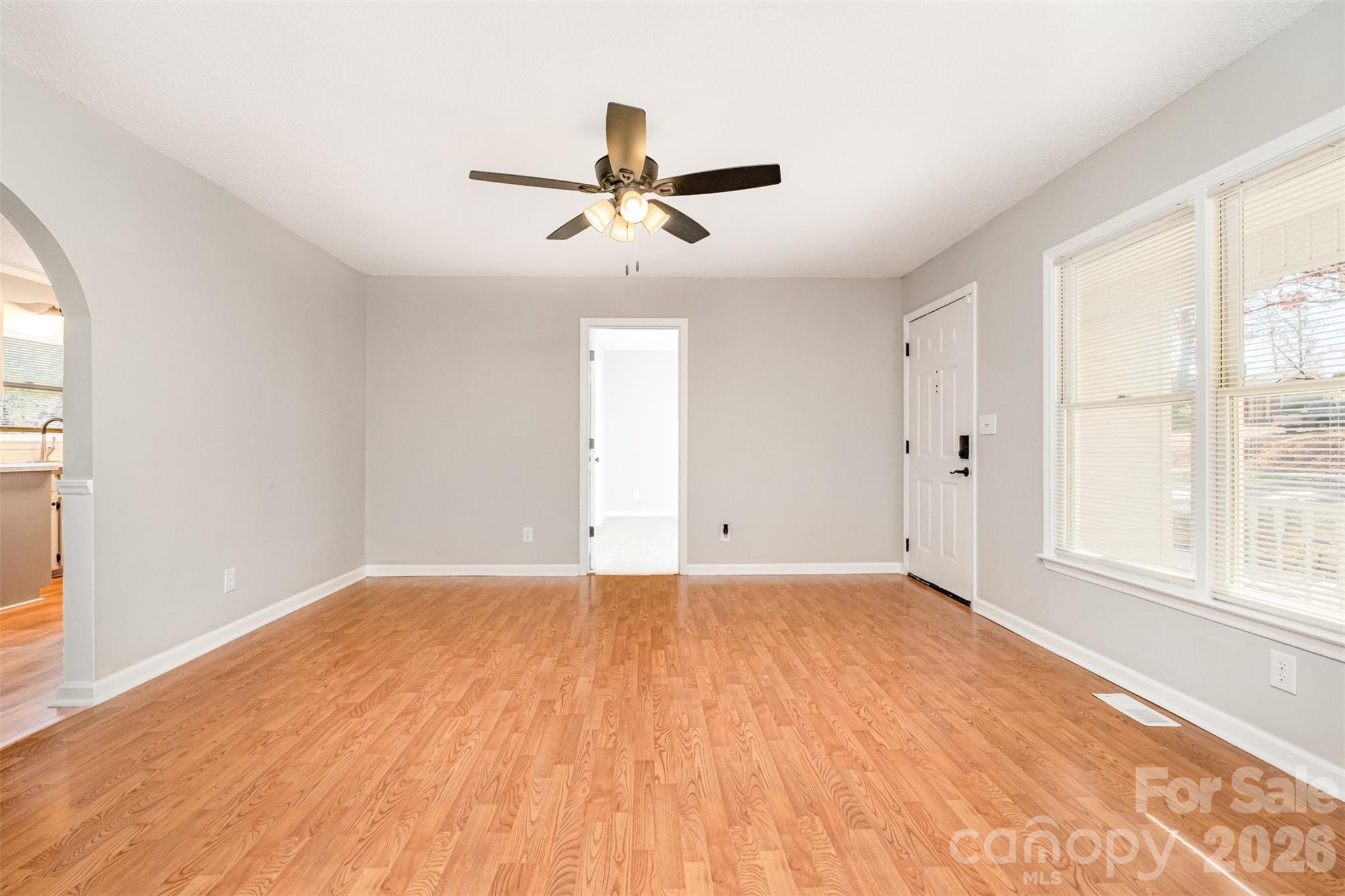 123 General Pemberton Street Stanley, NC 28164 - Photo 6 of 32 wooden floor in an empty room with a window