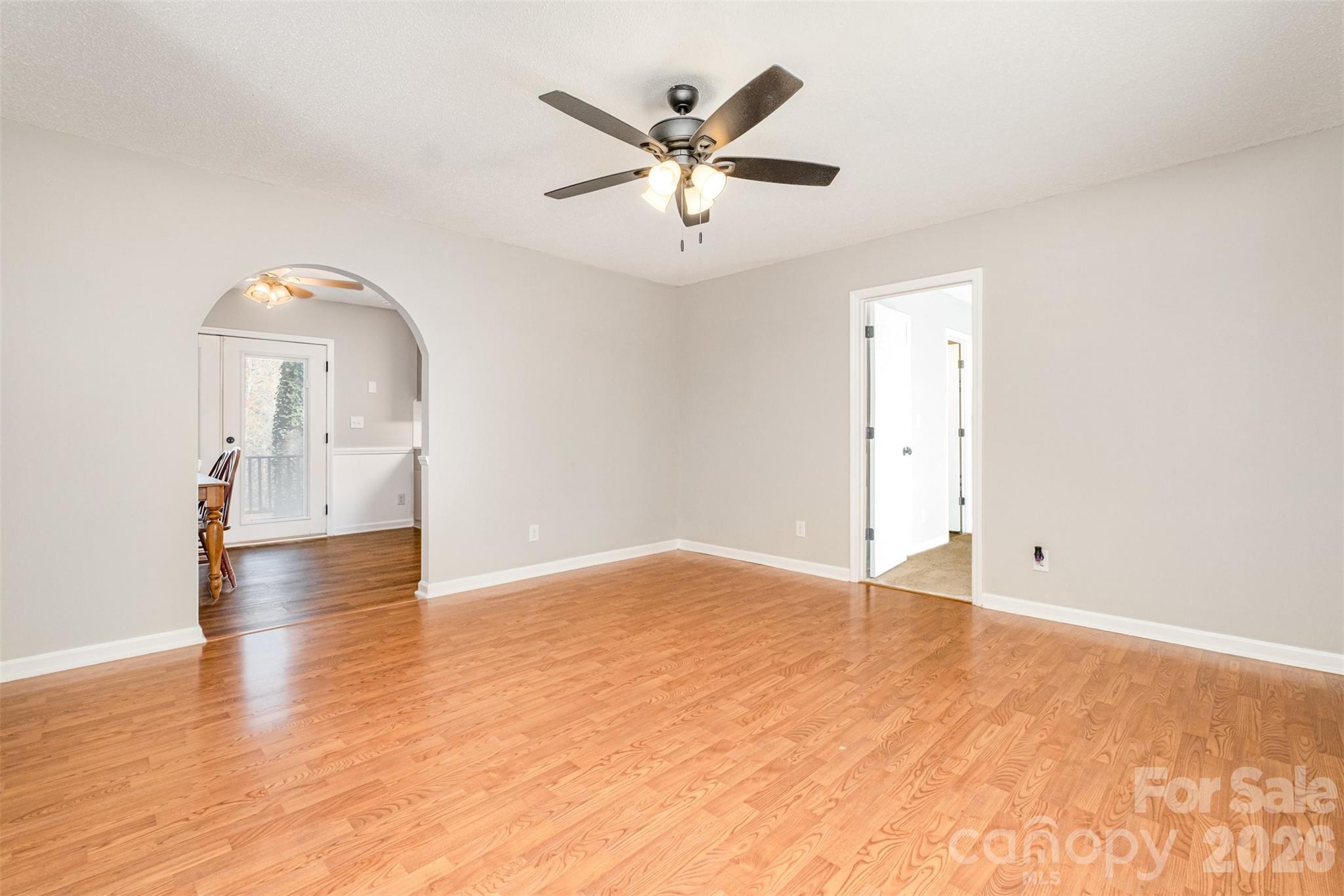 123 General Pemberton Street Stanley, NC 28164 - Photo 7 of 32 a view of an empty room with wooden floor