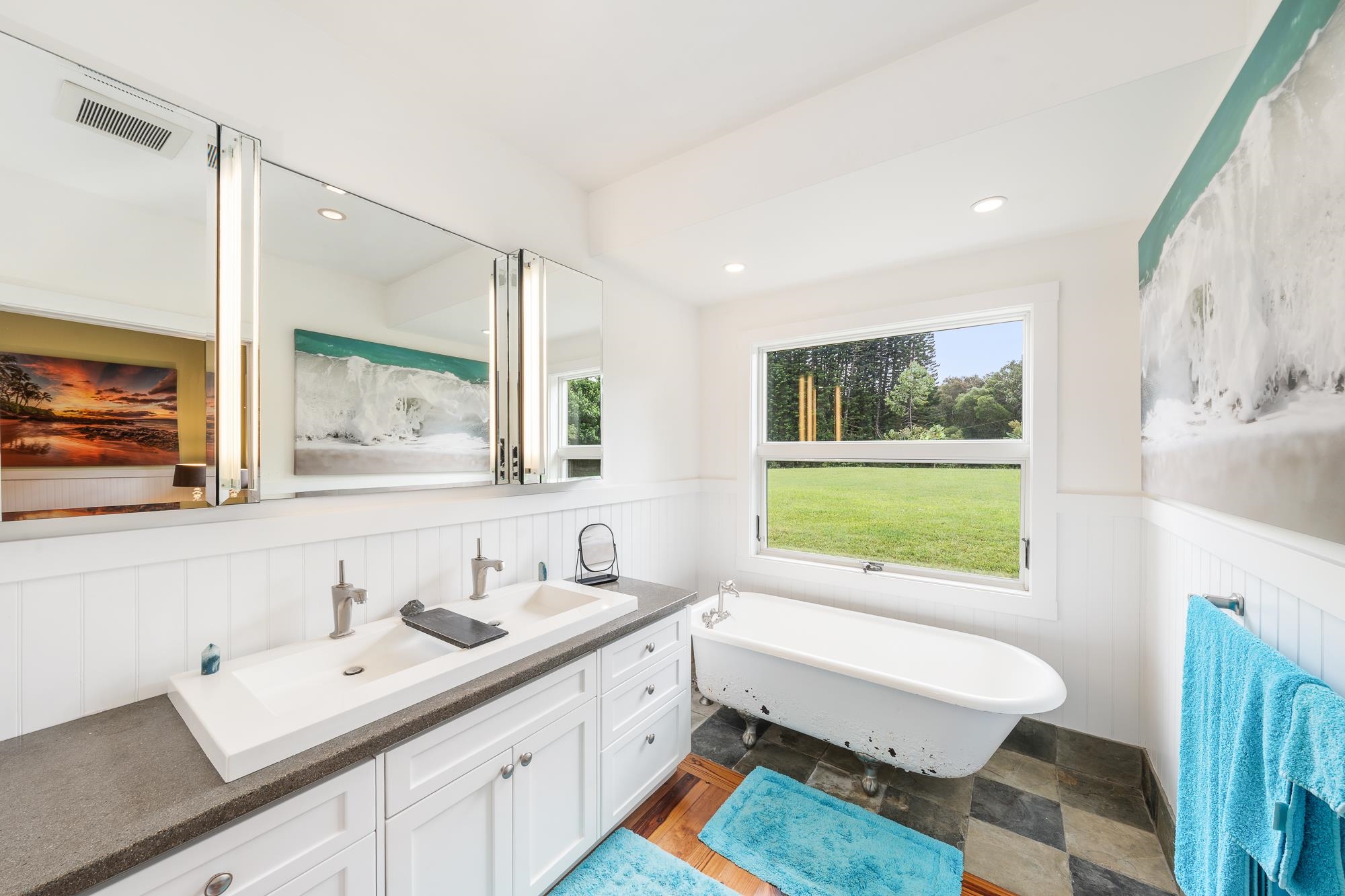 1949 West Kuiaha Road Haiku, HI 96708 - Photo 42 of 49 a bathroom with a sink mirror vanity and a bathtub