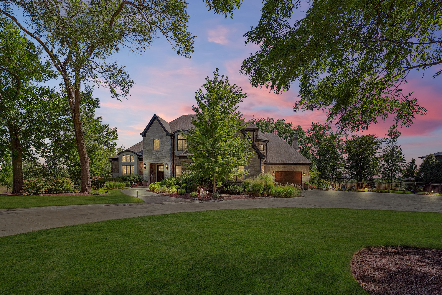 13125 Smith Road Manhattan, IL 60442 - Photo 1 of 1 a front view of a house with a garden and tree