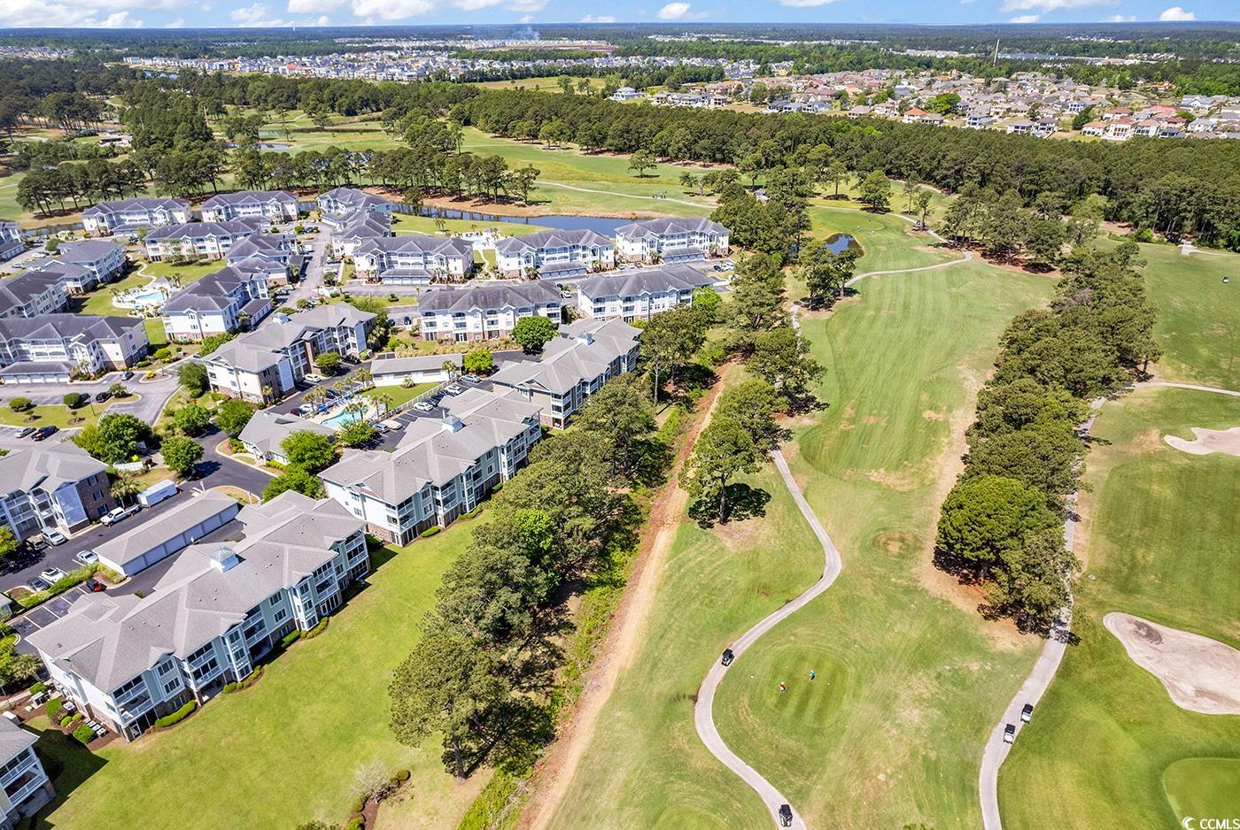 4893 Magnolia Pointe Lane, Unit 305 Myrtle Beach, SC 29577 - Photo 32 of 36 Drone / aerial view