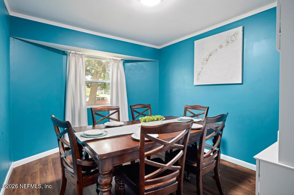 892 Trinidad Road Jacksonville, FL 32216 - Photo 11 of 37 a view of a dining room with furniture and window
