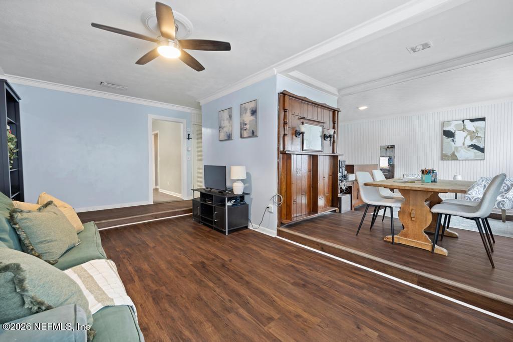892 Trinidad Road Jacksonville, FL 32216 - Photo 14 of 37 a living room with furniture and a wooden floor