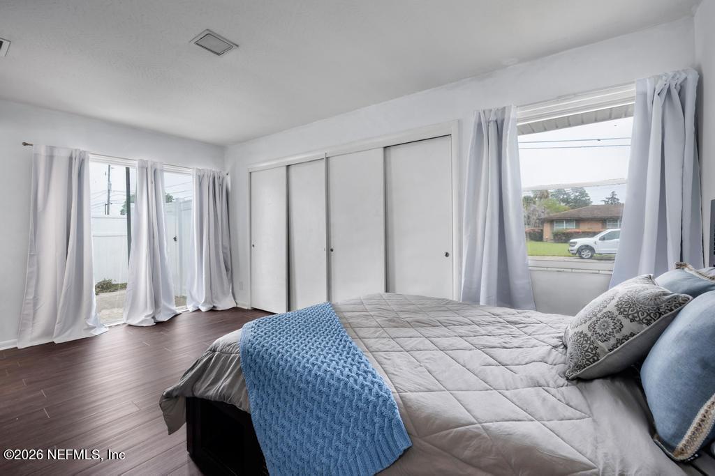 892 Trinidad Road Jacksonville, FL 32216 - Photo 21 of 37 a bedroom with a bed and a window