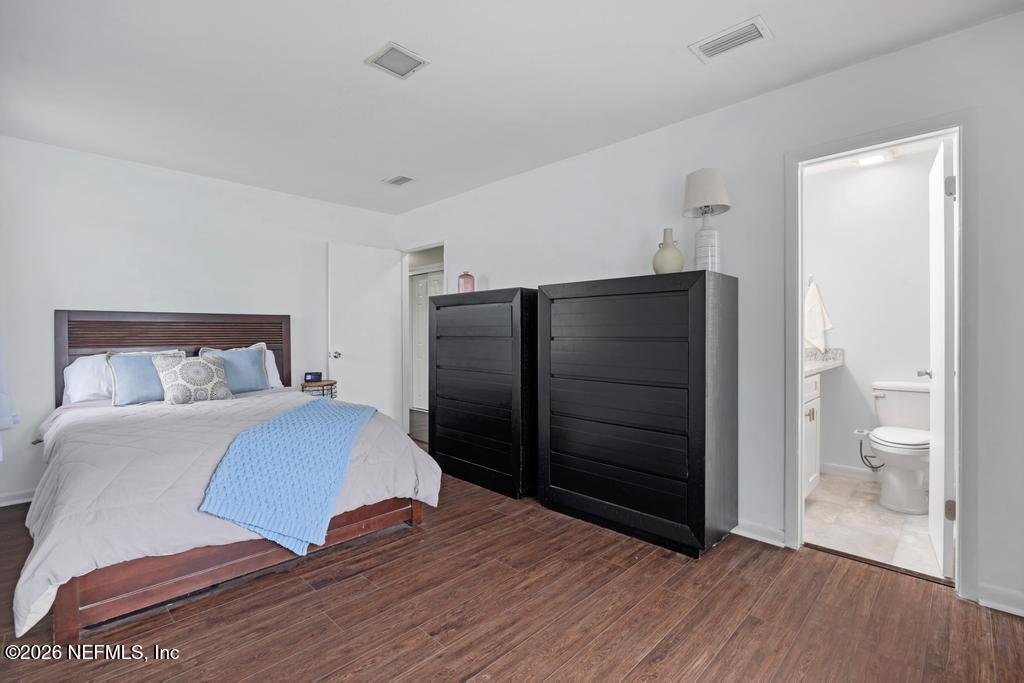 892 Trinidad Road Jacksonville, FL 32216 - Photo 22 of 37 a bedroom with a bed and a toilet