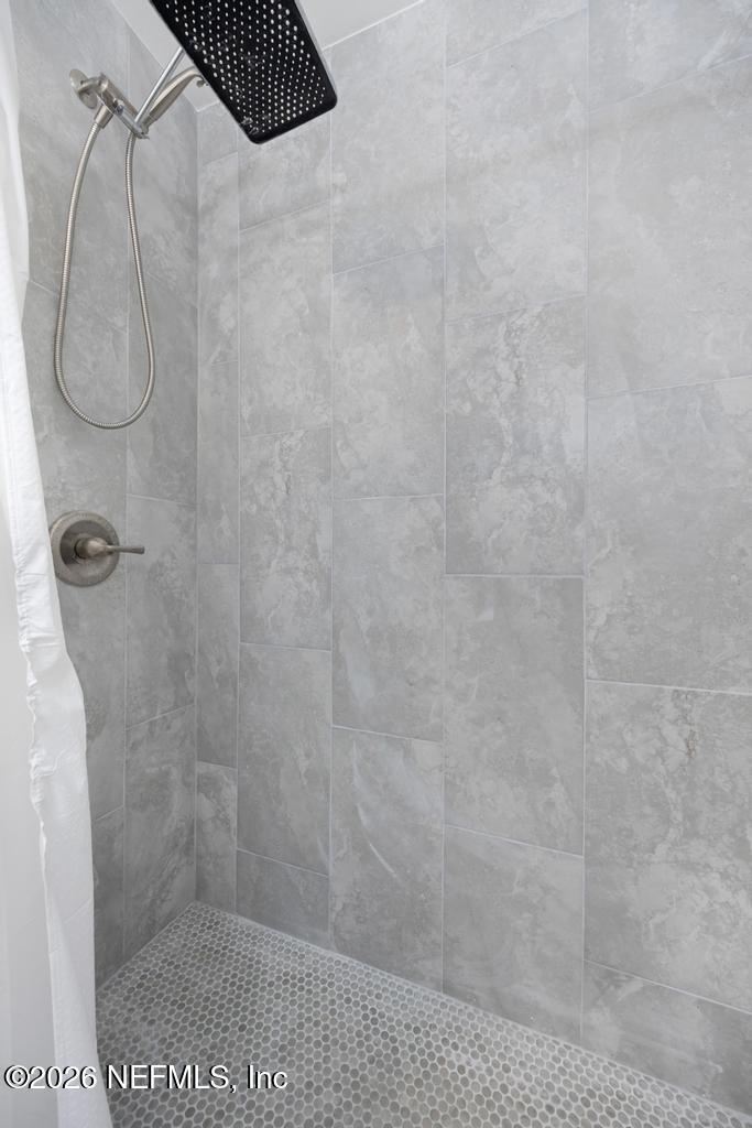 892 Trinidad Road Jacksonville, FL 32216 - Photo 24 of 37 a bathroom with a shower