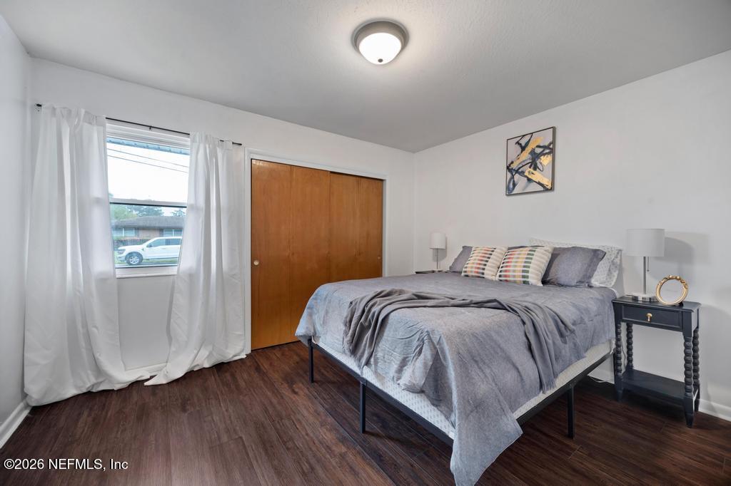 892 Trinidad Road Jacksonville, FL 32216 - Photo 25 of 37 a bedroom with a bed and a window