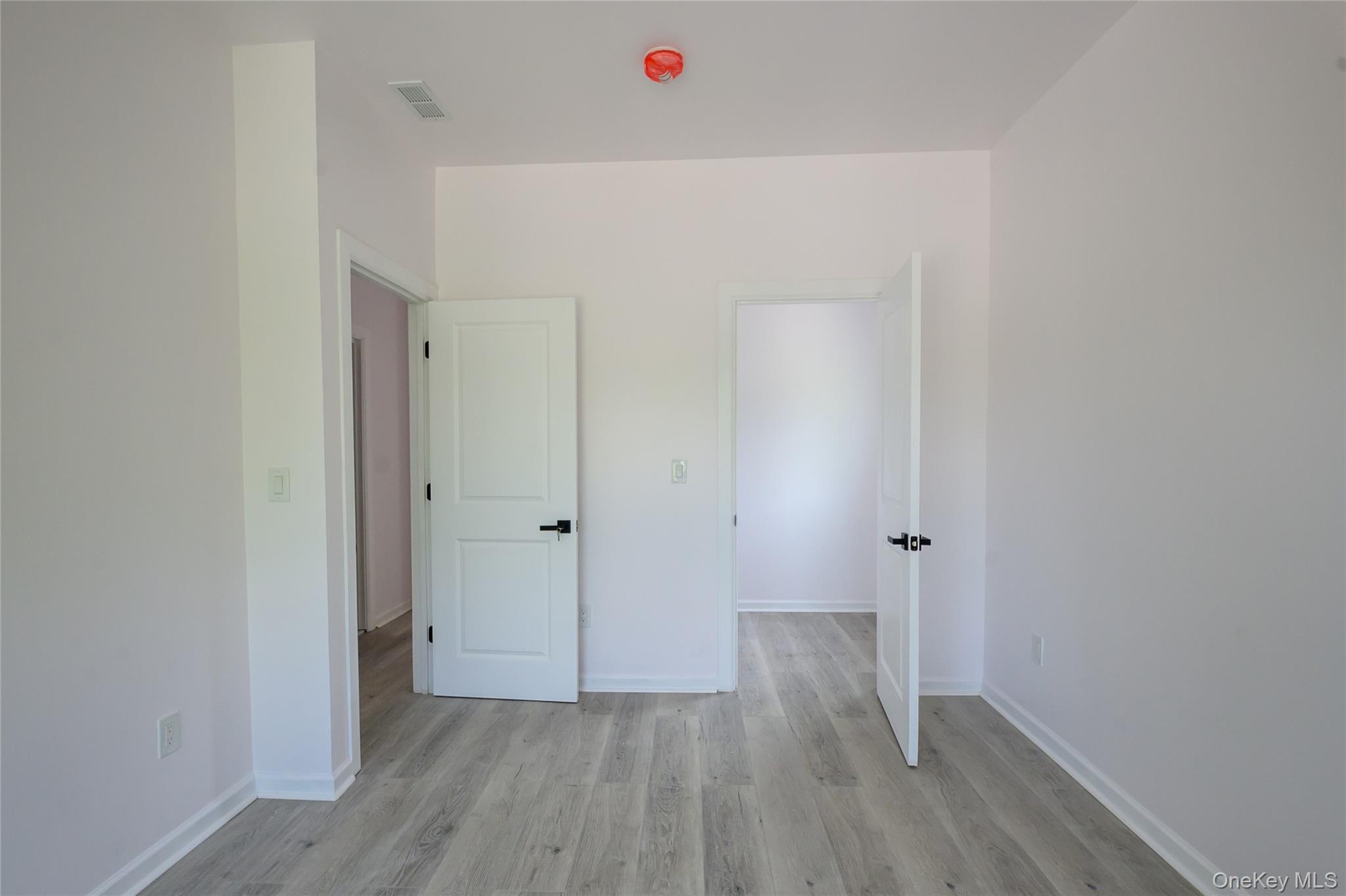 81 Silver Lake Sctn Road Middletown, NY 10940 - Photo 27 of 37 a view of a room with wooden floor