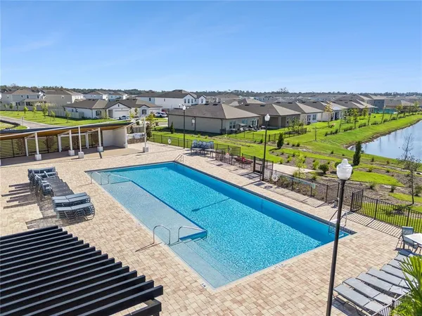 a view of a swimming pool with an ocean view