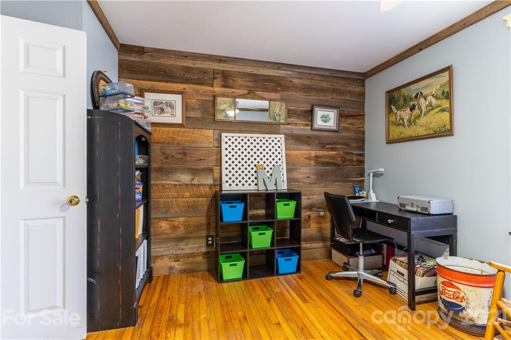 5743 Camp Creek Road Lancaster, SC 29720 - Photo 17 of 20 a workspace with furniture and wooden floor