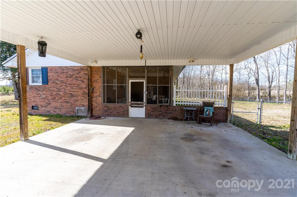 5743 Camp Creek Road Lancaster, SC 29720 - Photo 19 of 20 a living room with furniture oven and a table