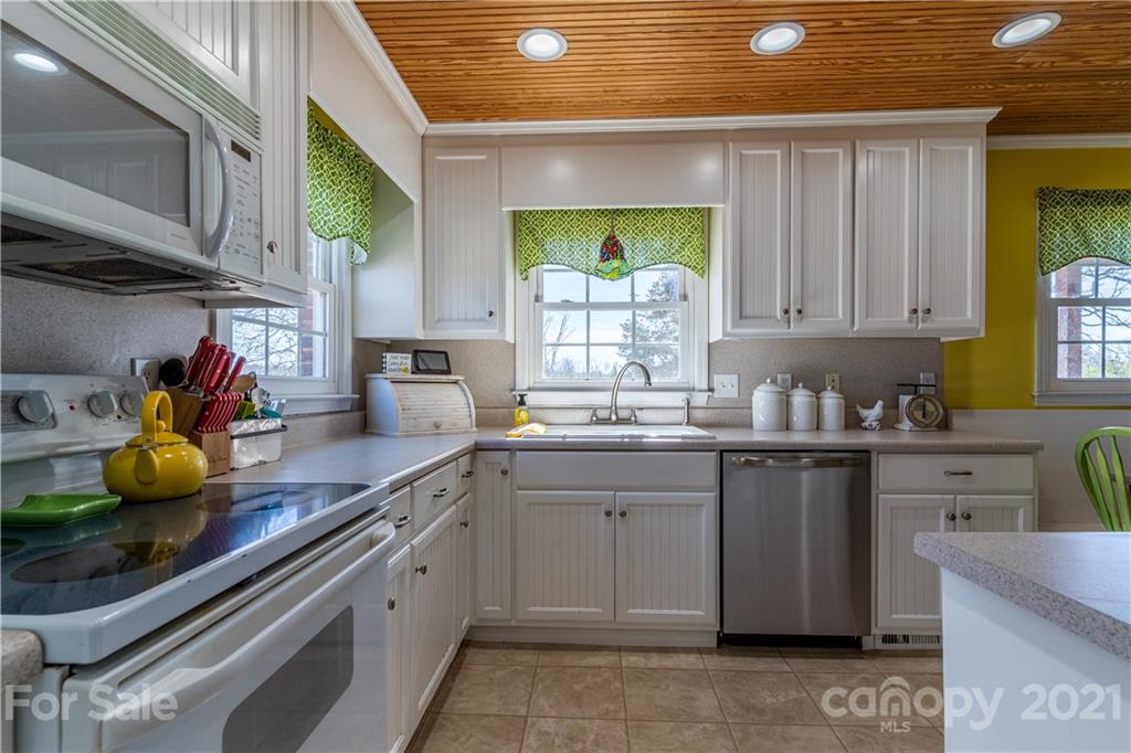 5743 Camp Creek Road Lancaster, SC 29720 - Photo 5 of 20 a kitchen with a sink cabinets and window