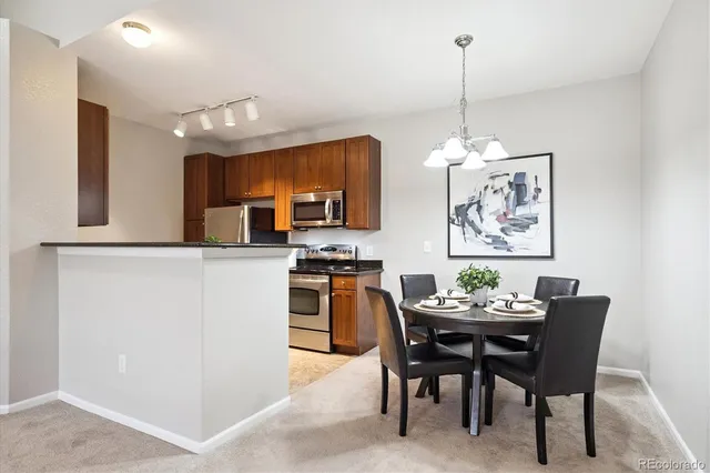 a view of a dining room with furniture