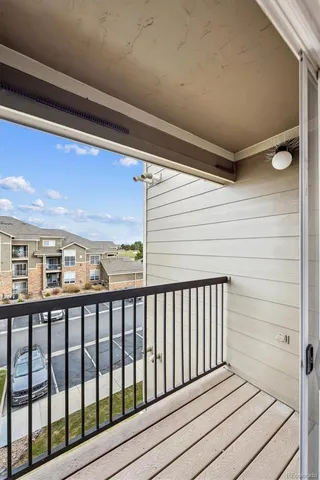a view of a houses from a balcony