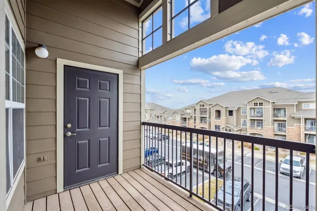 a bedroom with bed and a window