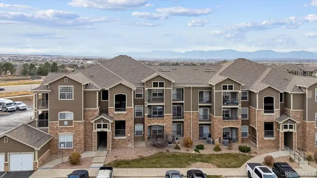 an aerial view of a city with ocean view