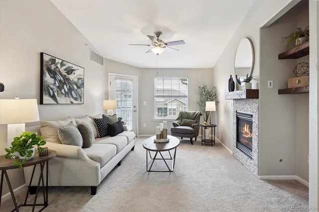 a view of a balcony with furniture