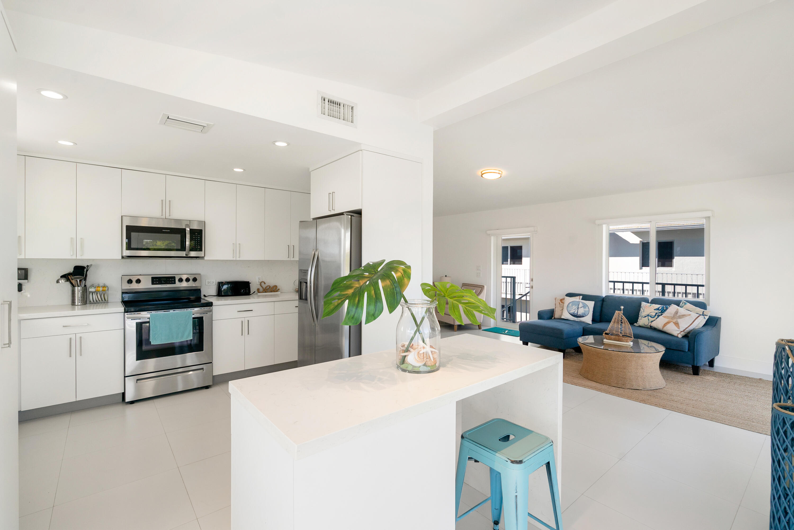 204 La Paloma Road Key Largo, FL 33037 - Photo 19 of 35 a kitchen with sink a counter top space and appliances