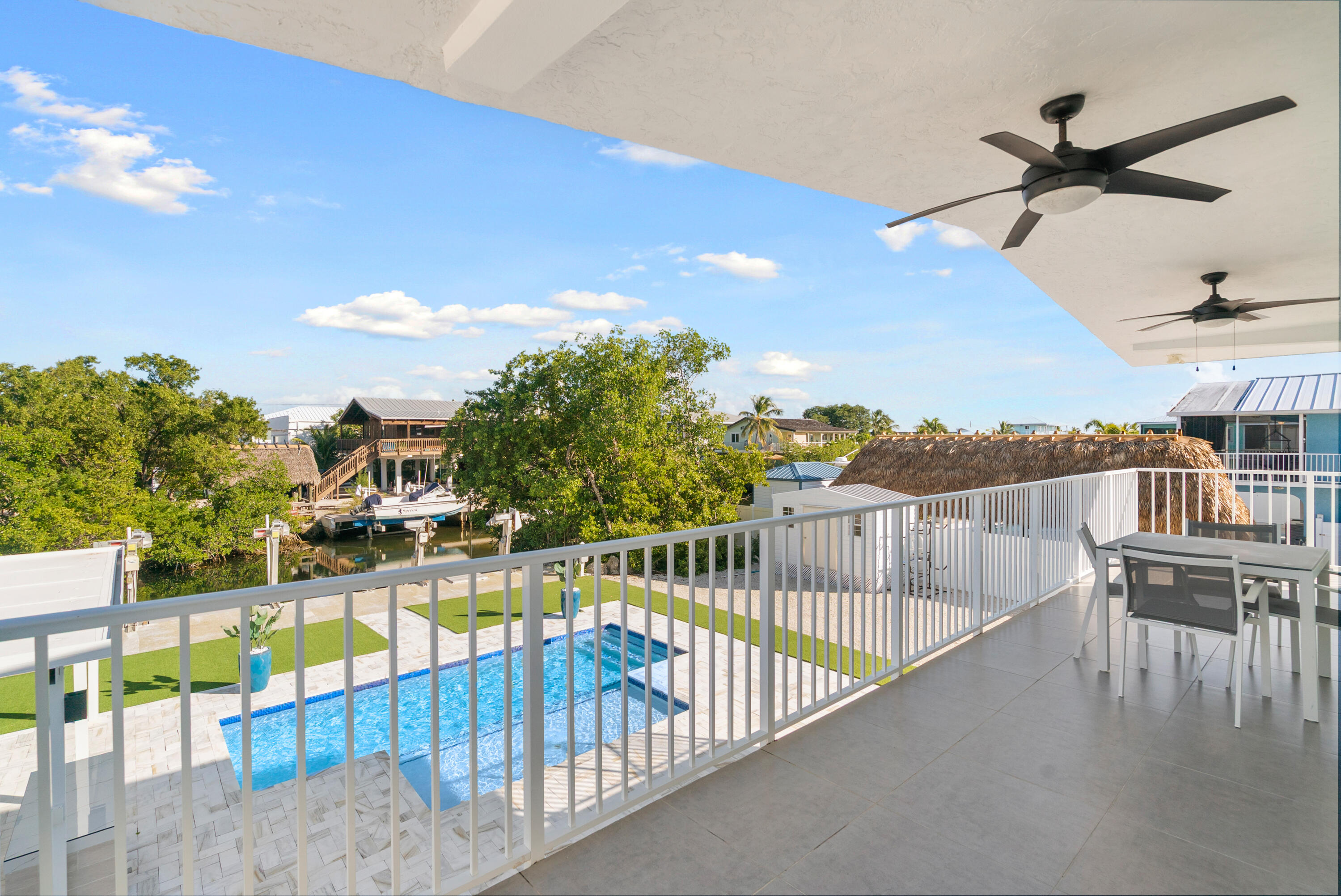 204 La Paloma Road Key Largo, FL 33037 - Photo 2 of 35 a view of a balcony with lake view and city view