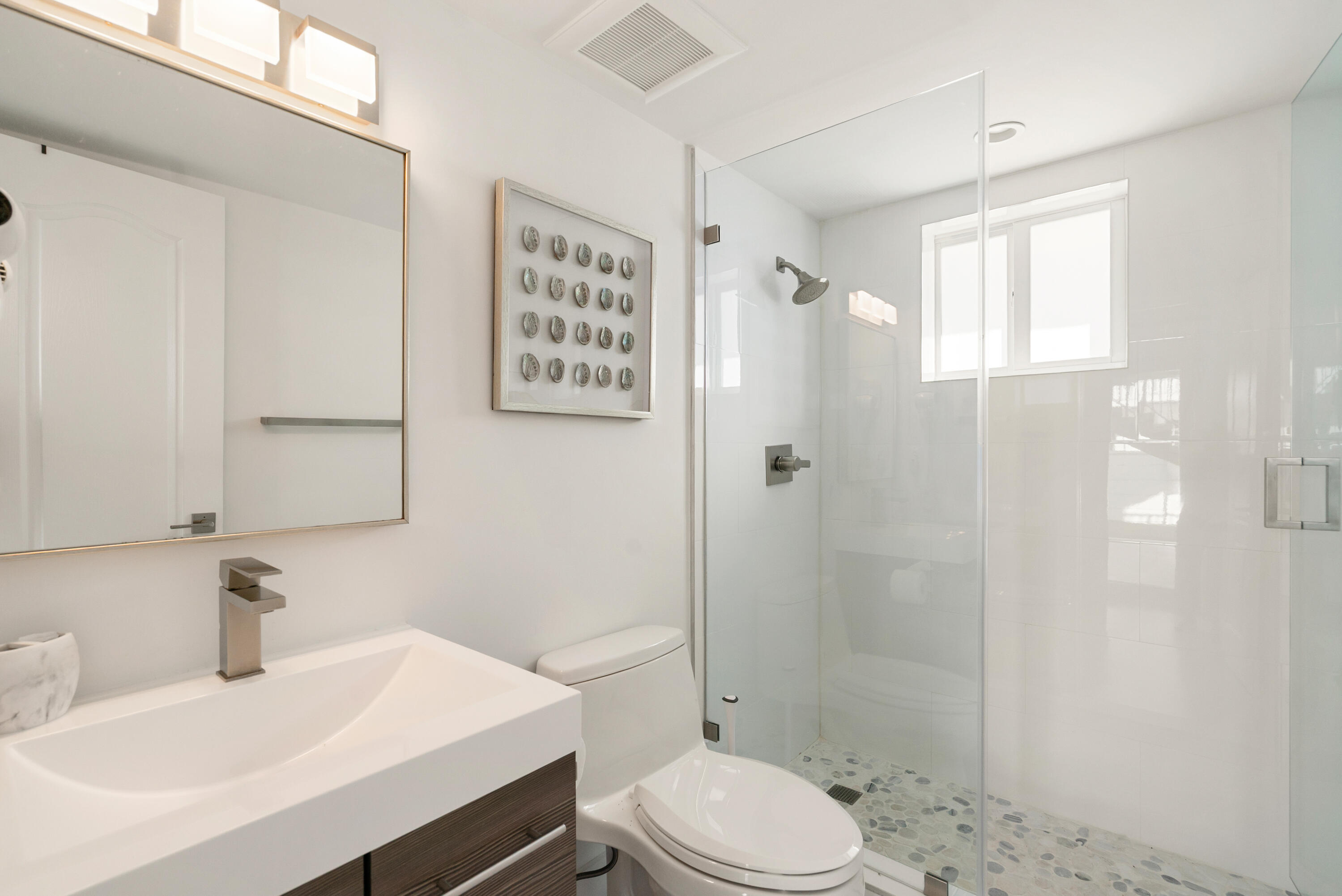 204 La Paloma Road Key Largo, FL 33037 - Photo 28 of 35 a bathroom with a sink toilet and shower