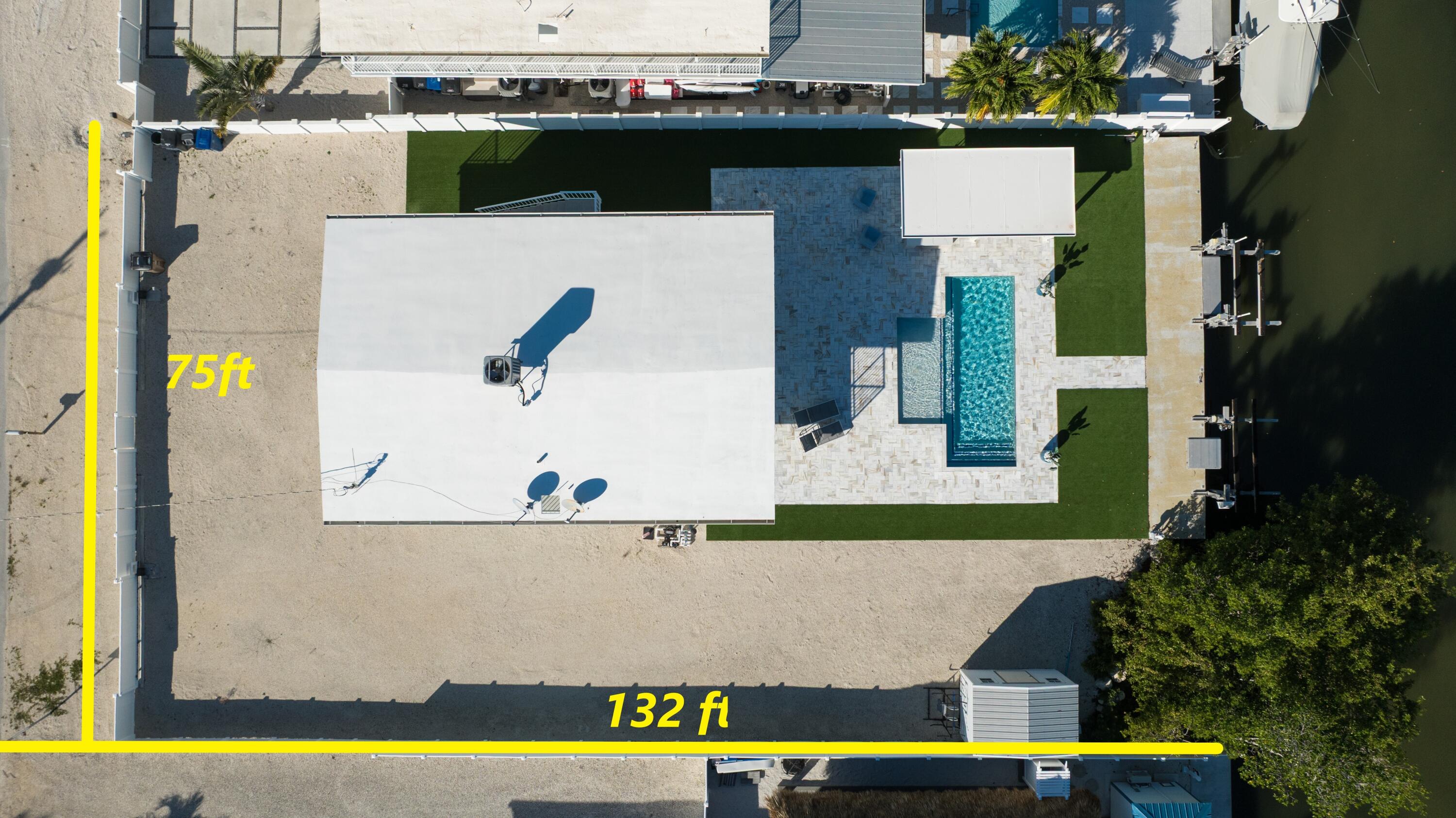 204 La Paloma Road Key Largo, FL 33037 - Photo 31 of 35 an aerial view of a house with swimming pool
