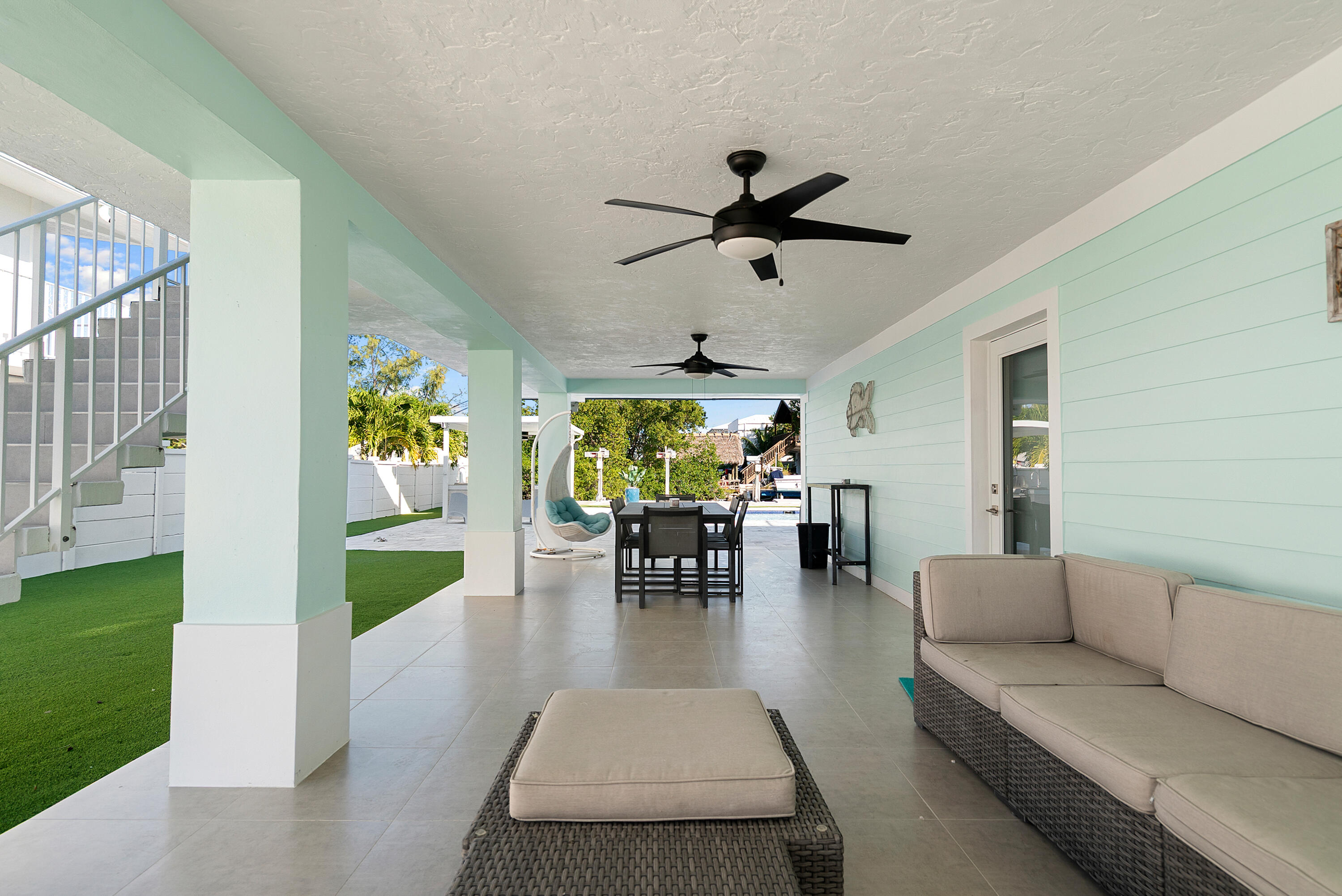 204 La Paloma Road Key Largo, FL 33037 - Photo 4 of 35 a living room with furniture and a large window