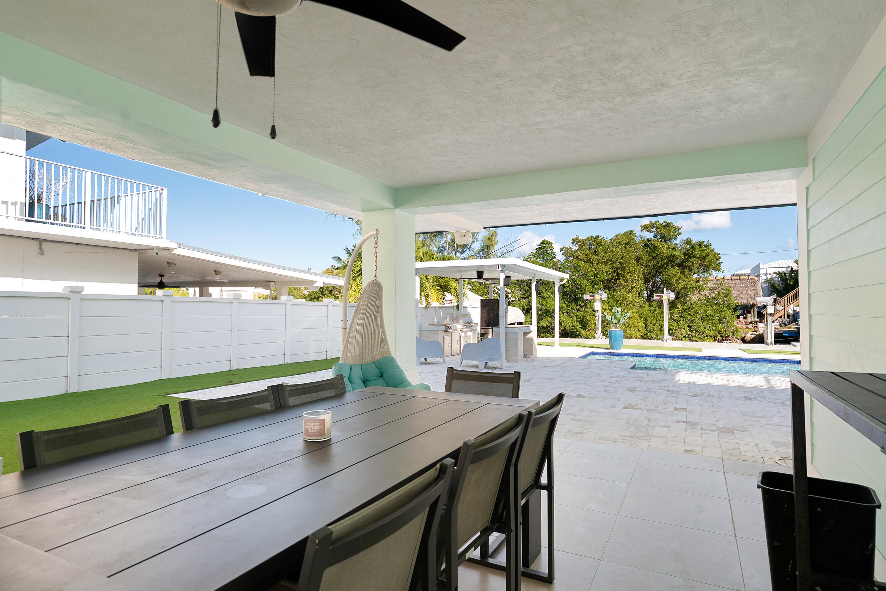 204 La Paloma Road Key Largo, FL 33037 - Photo 6 of 35 a view of a dining room with furniture window and outside view