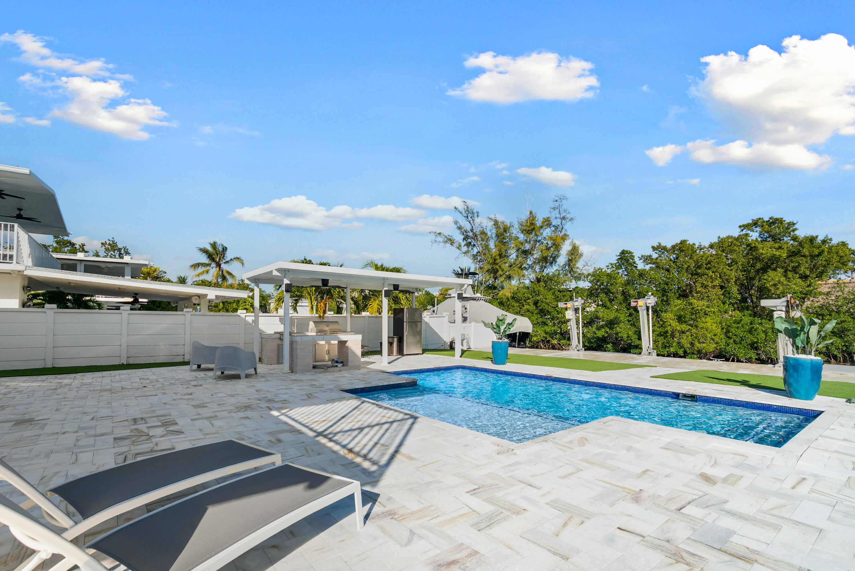 204 La Paloma Road Key Largo, FL 33037 - Photo 9 of 35 a view of a house with swimming pool