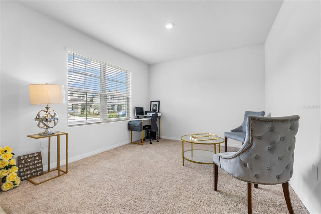 821 Sun Burst Road Winter Haven, FL 33880 - Photo 13 of 86 a living room with furniture and a window