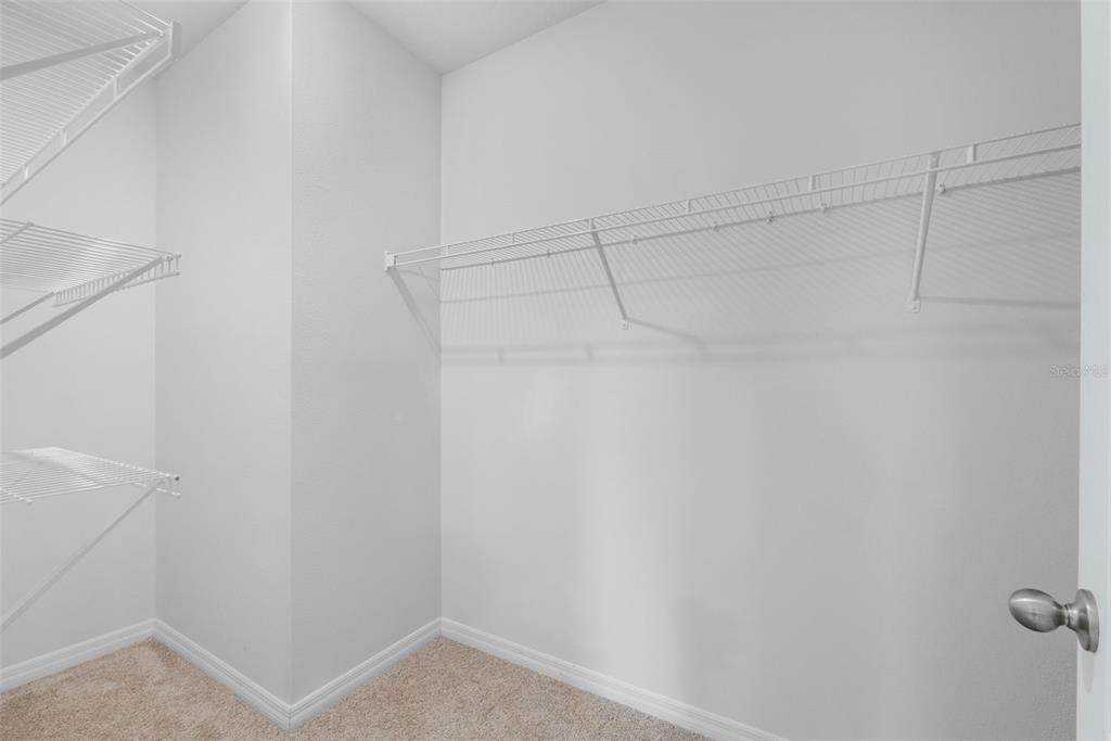 821 Sun Burst Road Winter Haven, FL 33880 - Photo 47 of 86 a view of a room with racks on the wall
