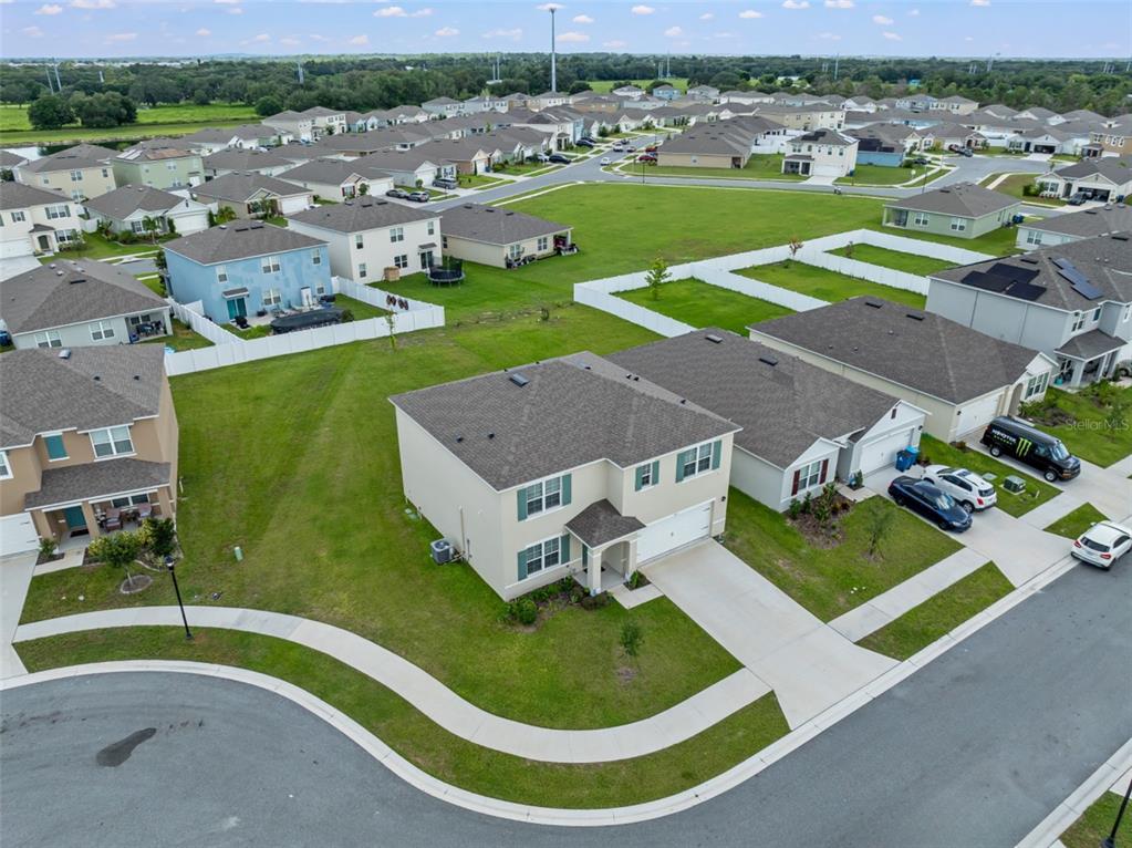 821 Sun Burst Road Winter Haven, FL 33880 - Photo 74 of 86 an aerial view of a house with a garden