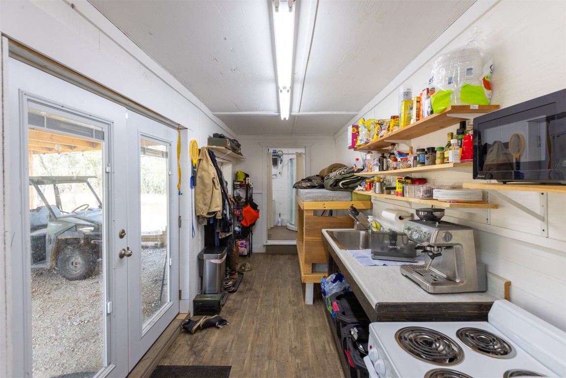 38 County Road 550 Mullin, TX 76864 - Photo 11 of 36 a room with furniture a flat screen tv and a window