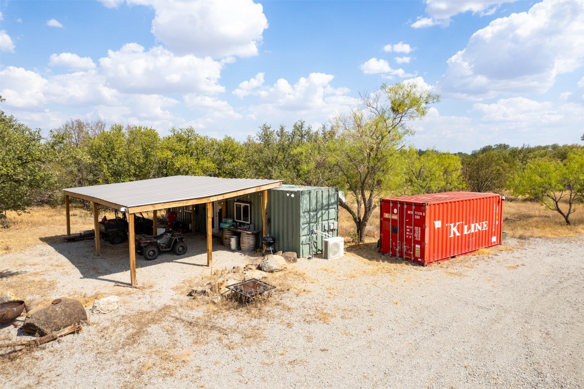 38 County Road 550 Mullin, TX 76864 - Photo 10 of 36 a view of a house with wooden fence