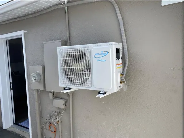 an empty room with wooden floor