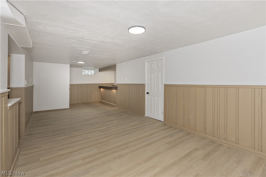 17917 McCracken Road Maple Heights, OH 44137 - Photo 36 of 48 Sprawling lower level recreation room w/ wet bar