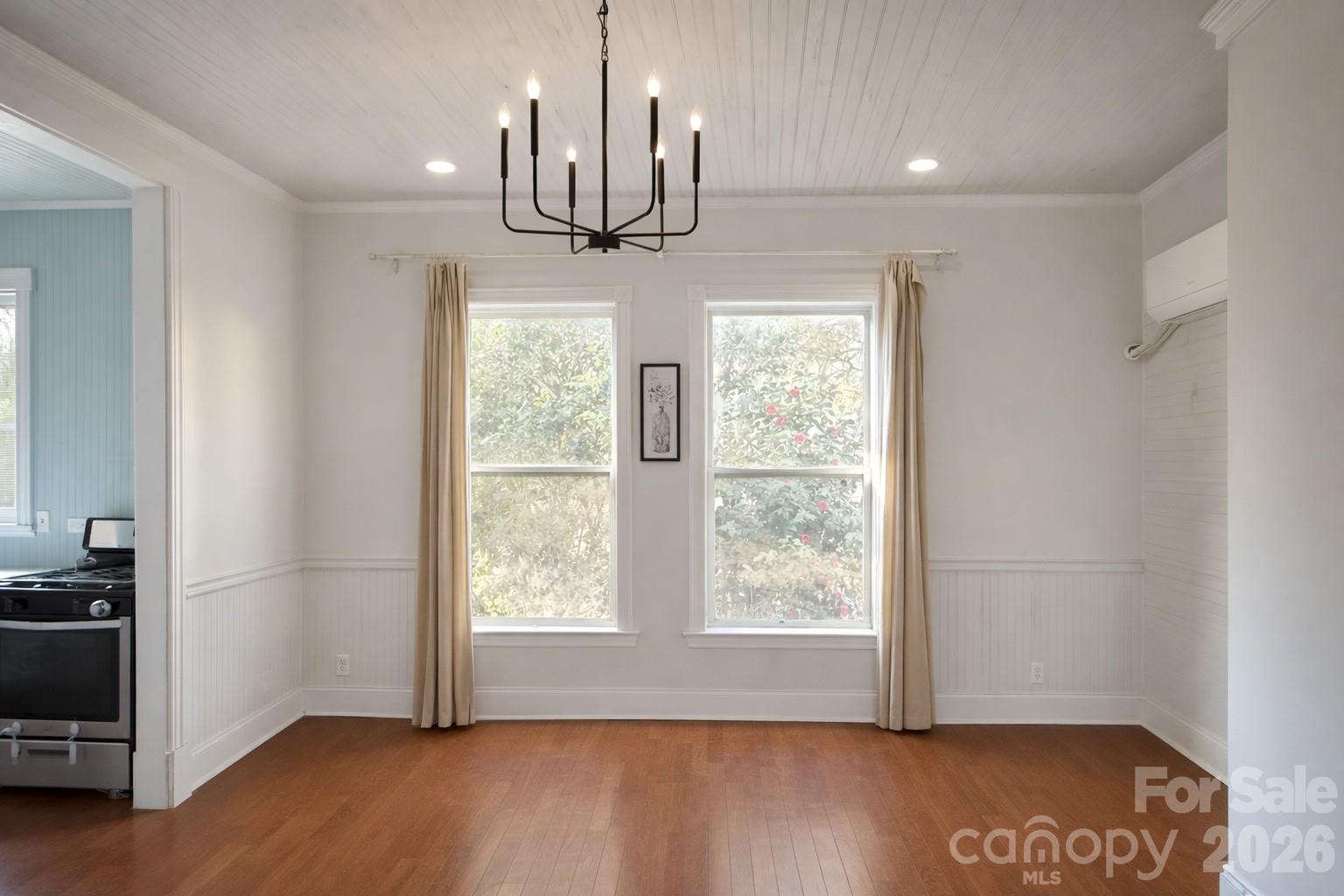 129 11th Street Spencer, NC 28159 - Photo 6 of 22 a view of empty room with wooden floor and fan