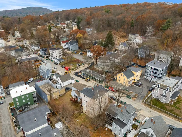 an aerial view of a city with lots of residential buildings