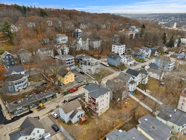 an aerial view of residential house with outdoor space