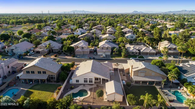 an aerial view of a house with a lot of residential houses