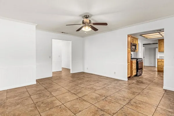 a view of an empty room and window