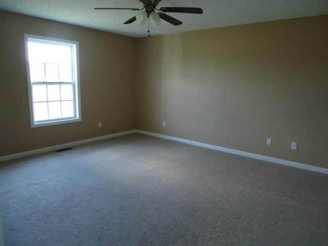 293 Williams Road Lafayette, TN 37083 - Photo 5 of 10 Master bedroom with walk-in closet