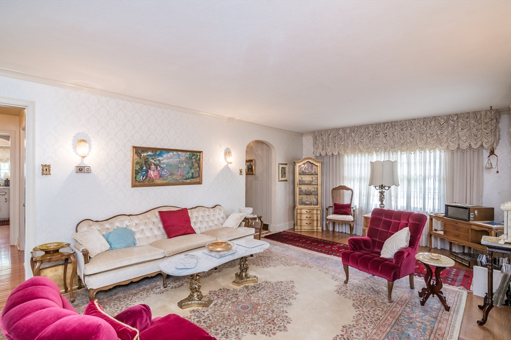 32 Longview Drive Longmeadow, MA 01106 - Photo 11 of 42 a living room with furniture and a large window