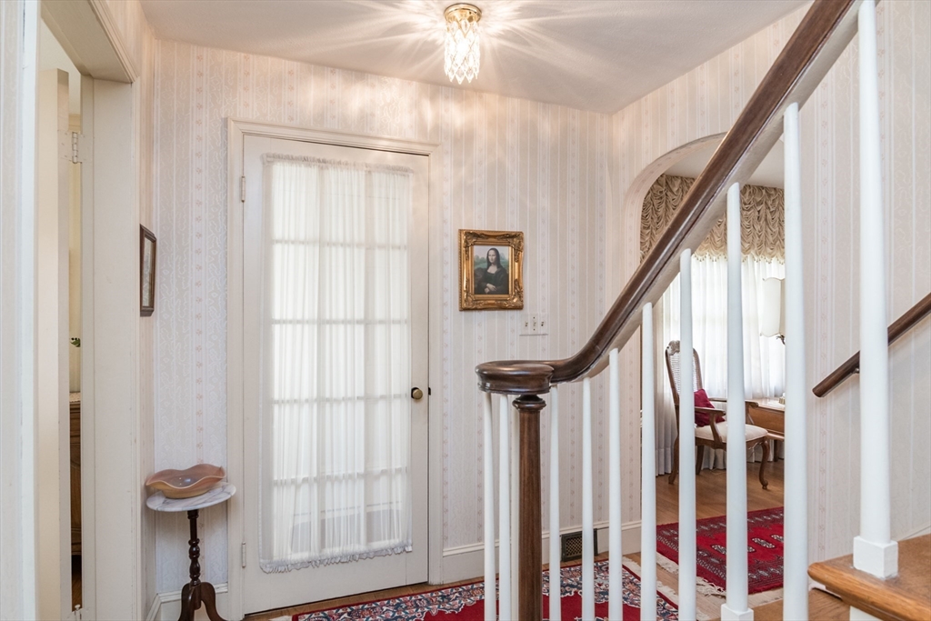 32 Longview Drive Longmeadow, MA 01106 - Photo 16 of 42 a view of staircase with white walls and a window