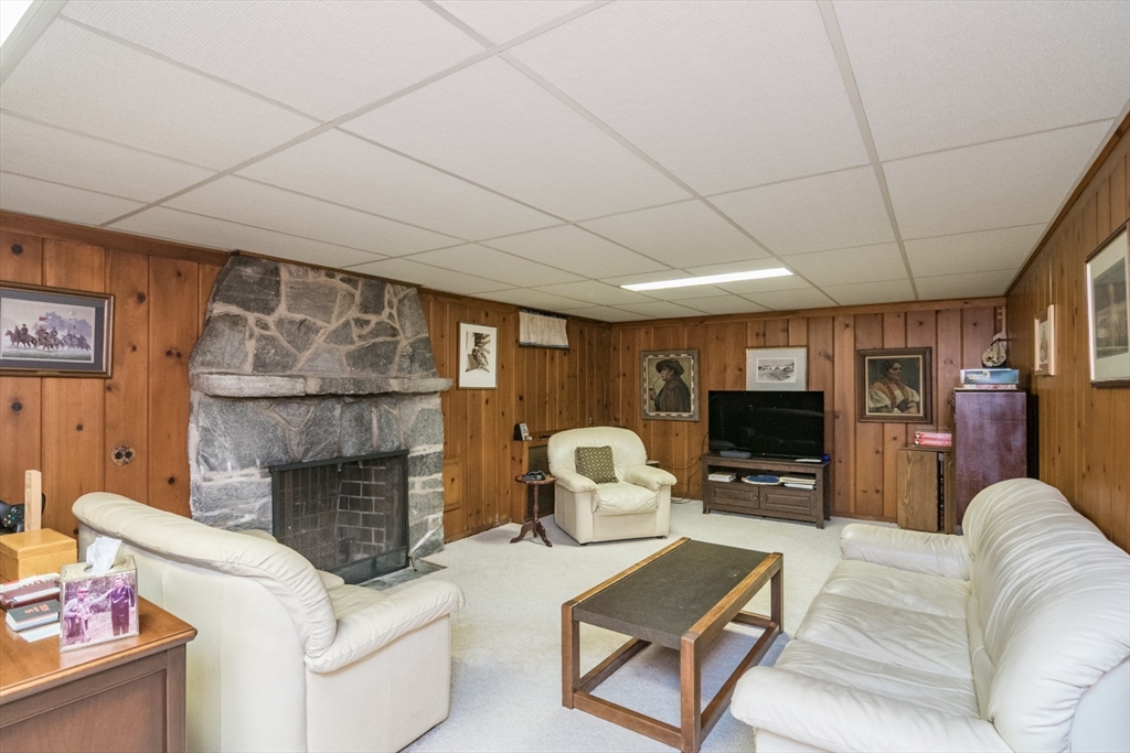 32 Longview Drive Longmeadow, MA 01106 - Photo 19 of 42 a living room with furniture and a fireplace