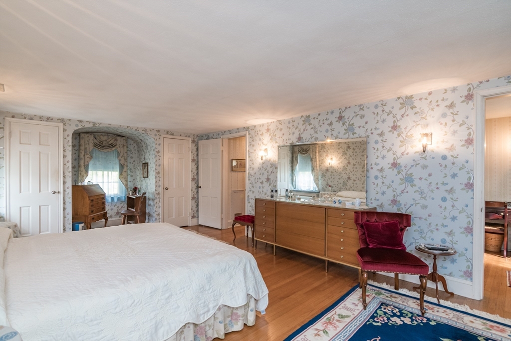 32 Longview Drive Longmeadow, MA 01106 - Photo 22 of 42 a bedroom with a bed and wooden floor
