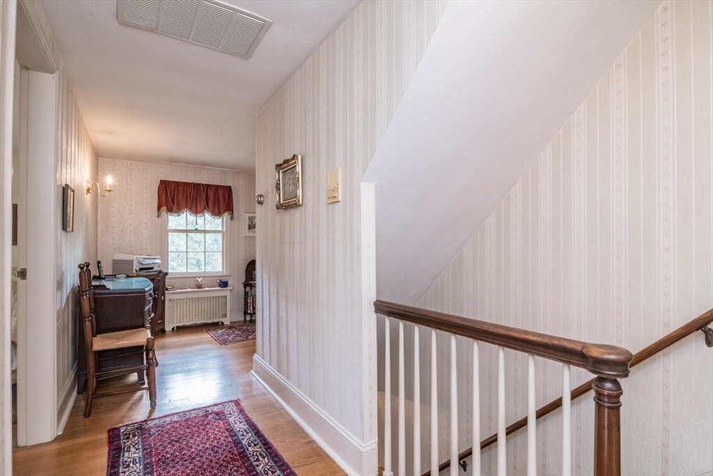 32 Longview Drive Longmeadow, MA 01106 - Photo 26 of 42 a living room with furniture and a wooden floor