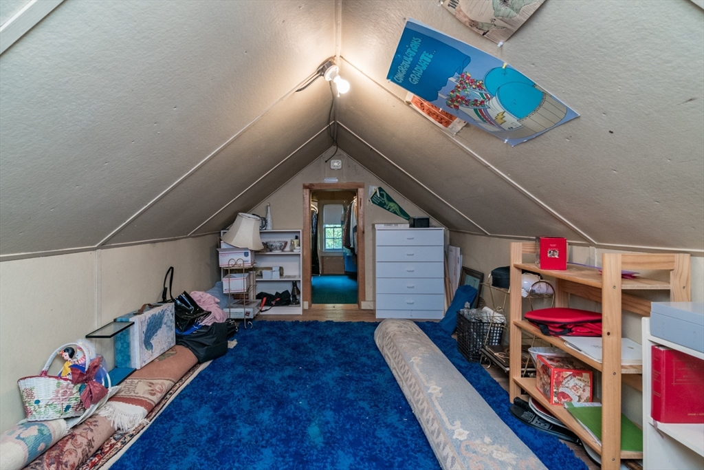 32 Longview Drive Longmeadow, MA 01106 - Photo 29 of 42 a hallway with toys and wooden floor